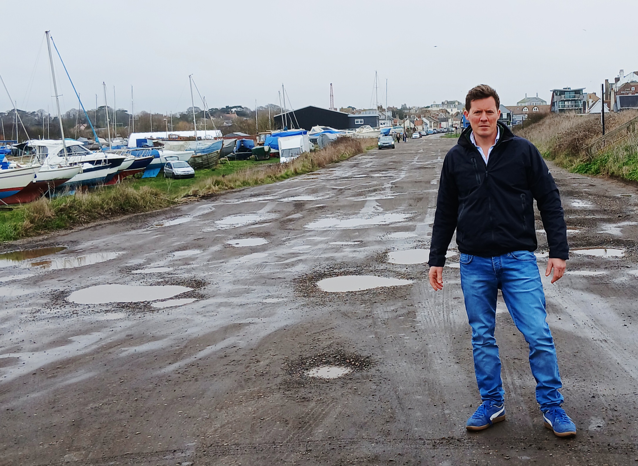 Tom Faulkner highlighting potholes in Aldeburgh